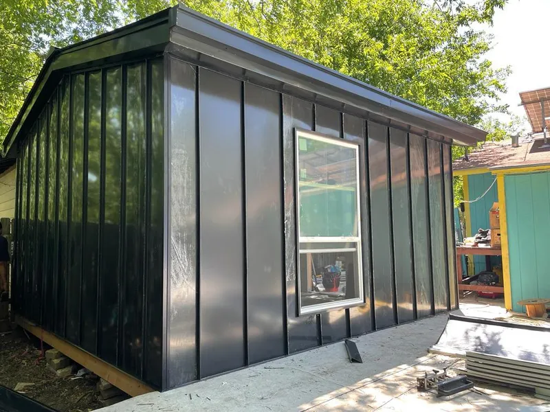 Black standing seam metal wall panels for Roof Inspection in Kaukauna