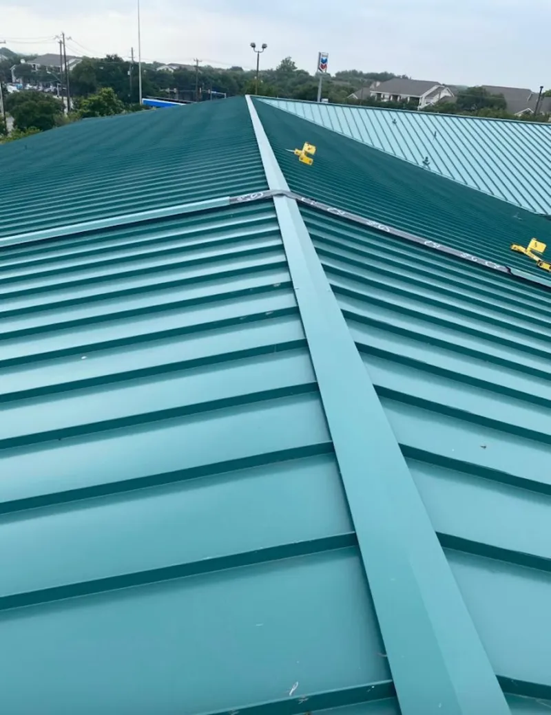 Green commercial metal roof ridge and valley for Metal Roof Repair in Kaukauna